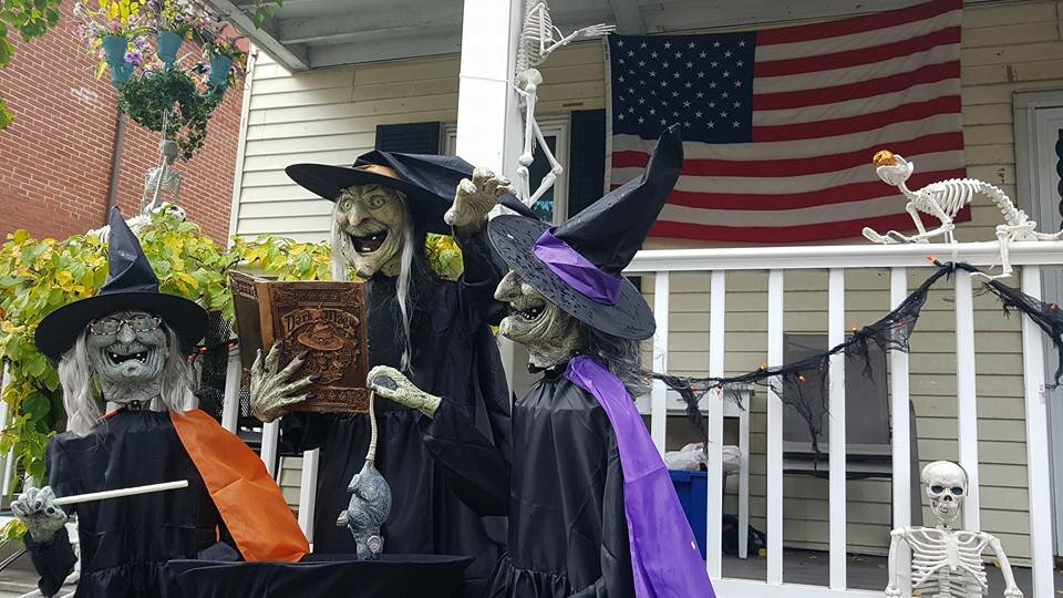 salem decorated for halloween witches outside a residential house