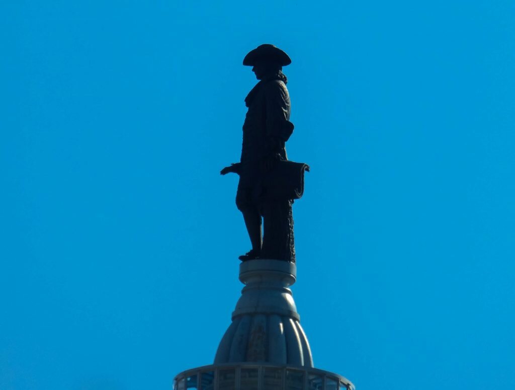 william penn on top of city hall in philadephia